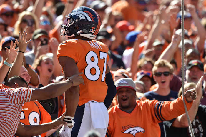 Denver Broncos tight end Noah Fant (87) celebrates his touchdown with the fans in the south stands against the Jacksonville Jaguars at Empower Field at Mile High.